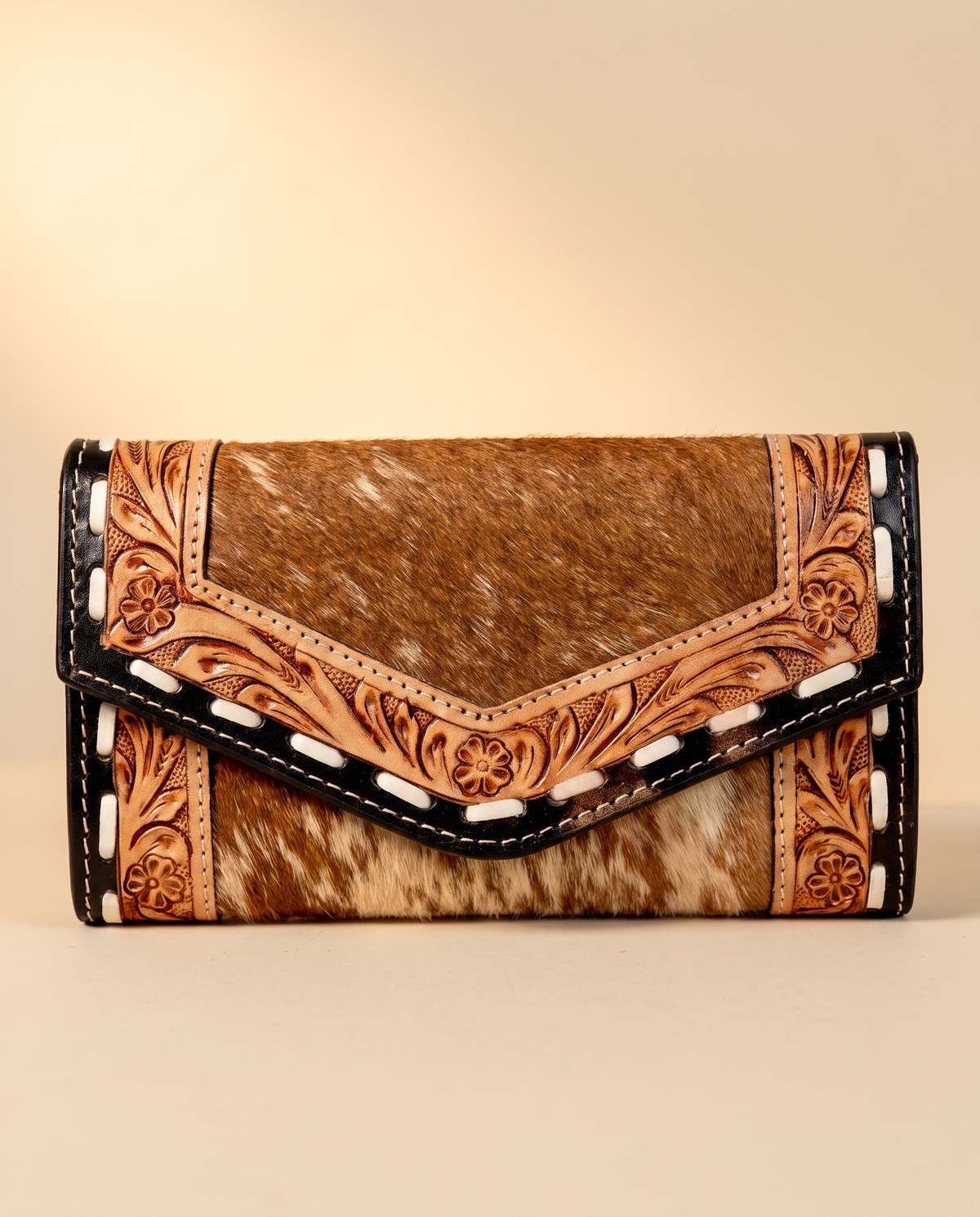 Cowhide envelope wallet with tooled whipstitch trim, front view, by Ya Qalbi