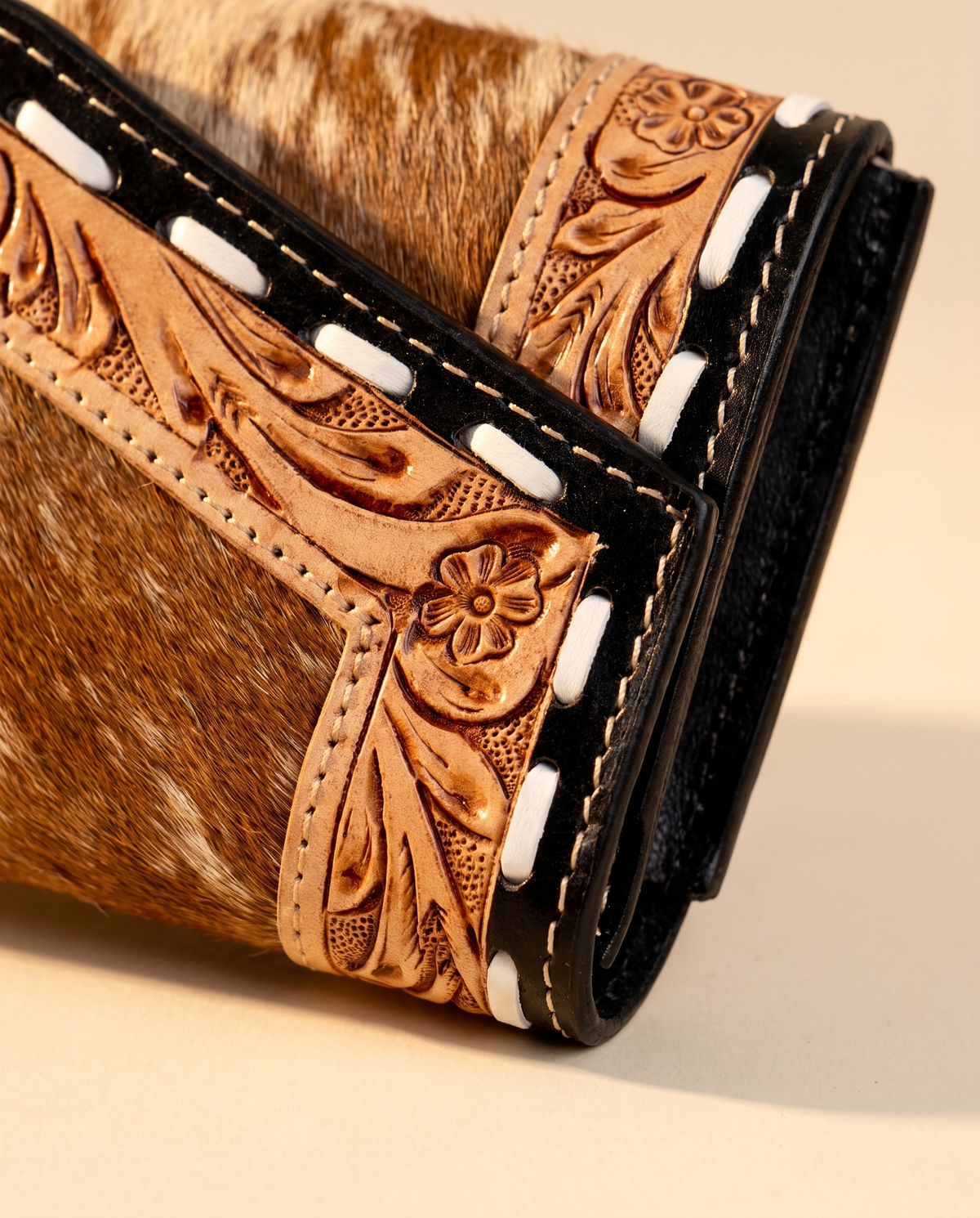 Cowhide envelope wallet with tooled whipstitch trim, detail close-up, by Ya Qalbi