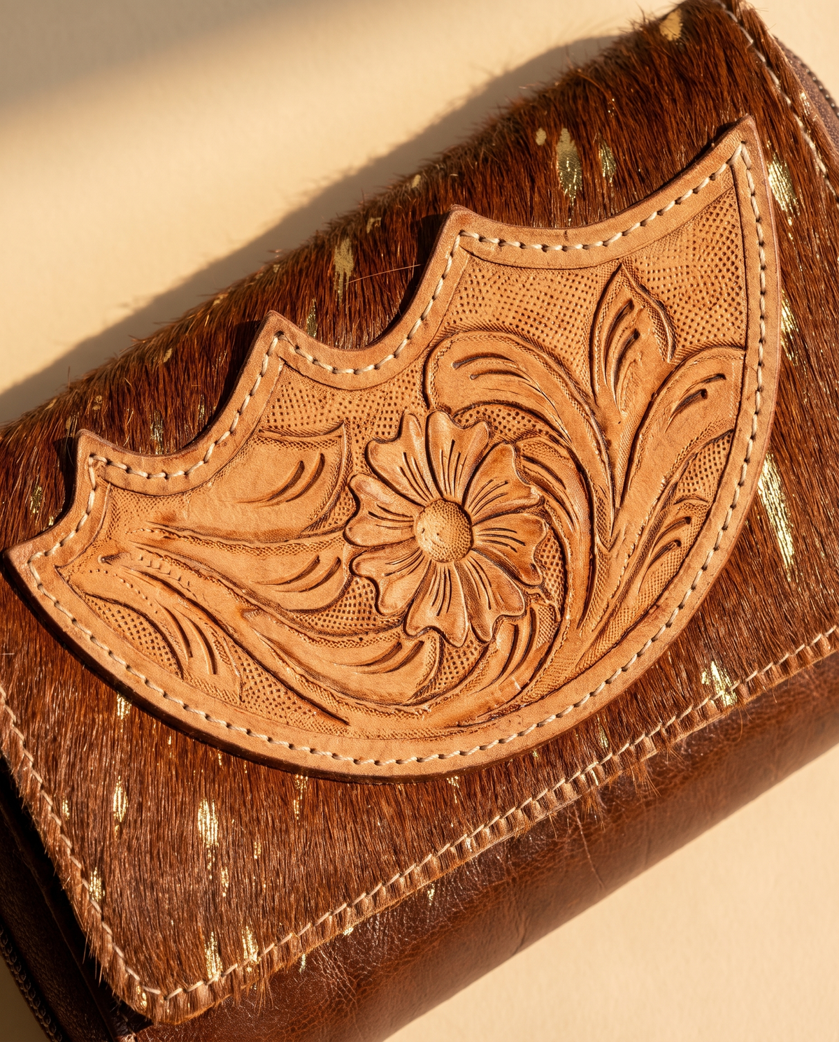 Cowhide wallet with scalloped hand-tooled flap, detail close-up, by Ya Qalbi