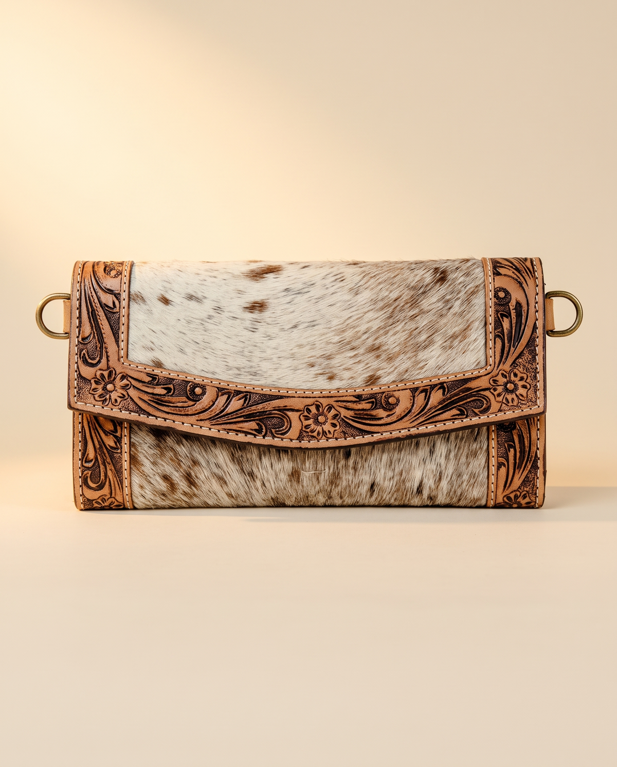 Cowhide wallet with hand-tooled frame, front view, by Ya Qalbi