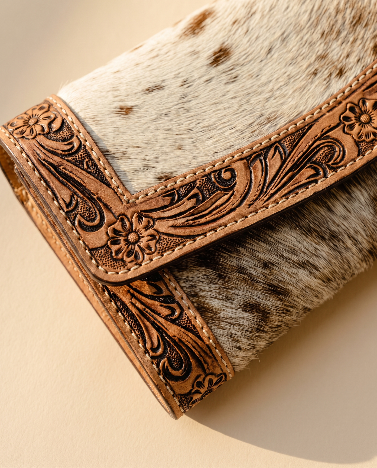 Cowhide wallet with hand-tooled frame, detail close-up, by Ya Qalbi