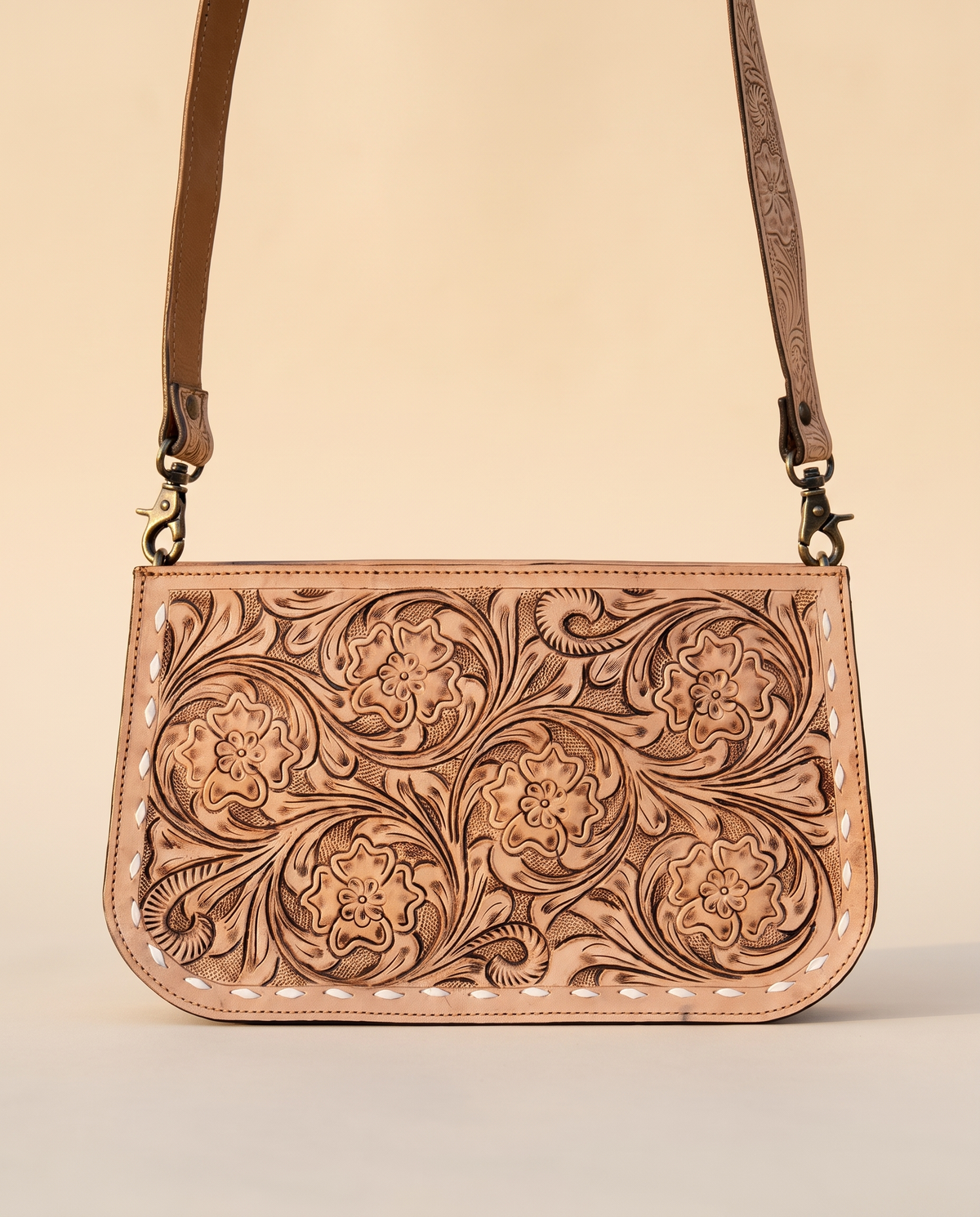 Tan tooled leather zip crossbody pouch
