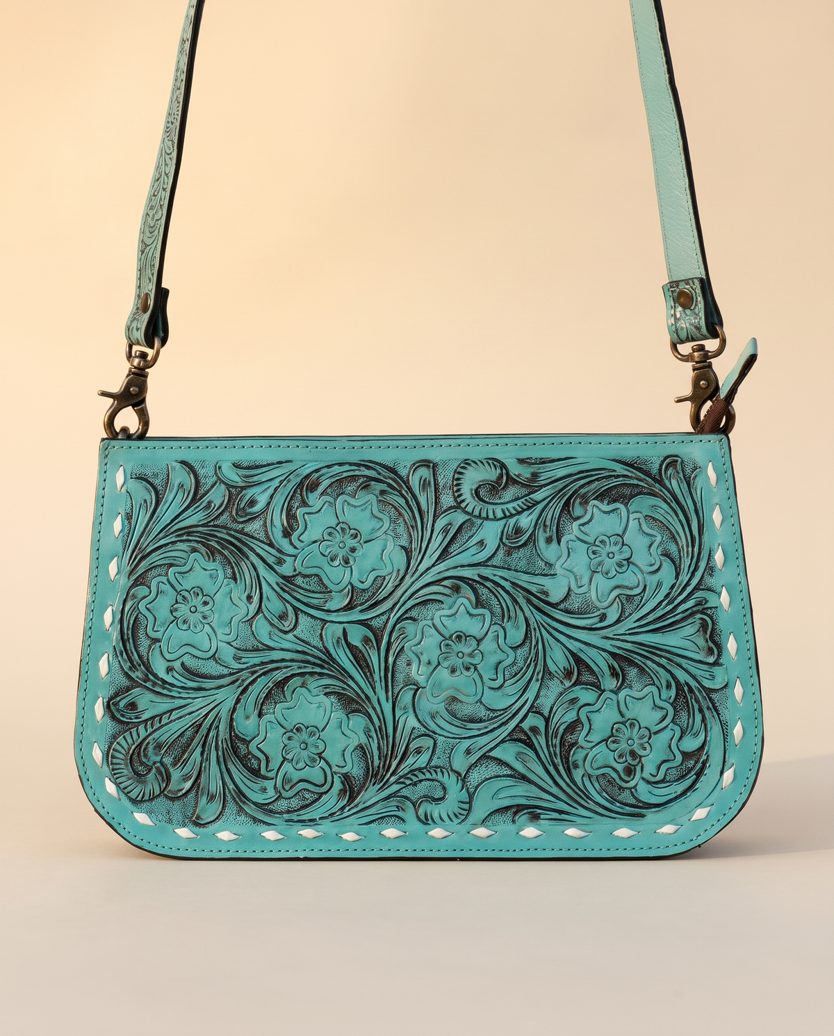 Turquoise tooled leather zip crossbody pouch
