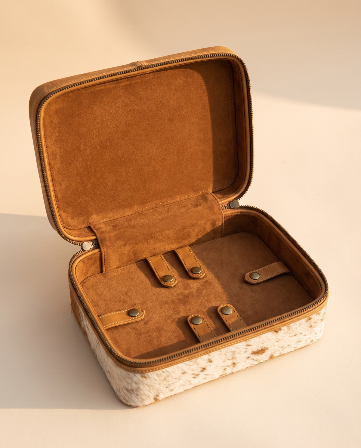 Two-tier cowhide jewellery case with hand-tooled lid, open interior view, by Ya Qalbi