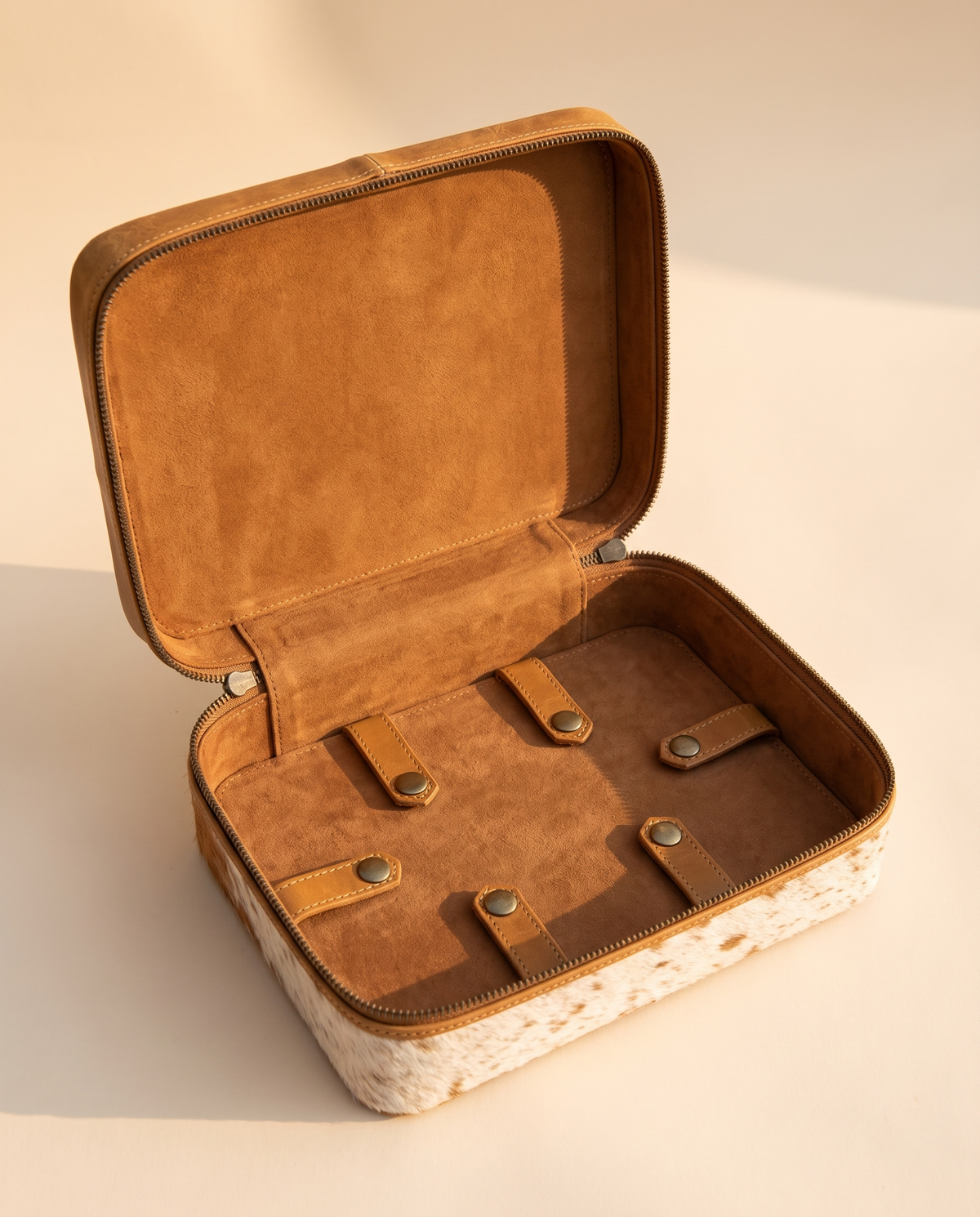 Two-tier cowhide jewellery case with hand-tooled lid, open interior view, by Ya Qalbi
