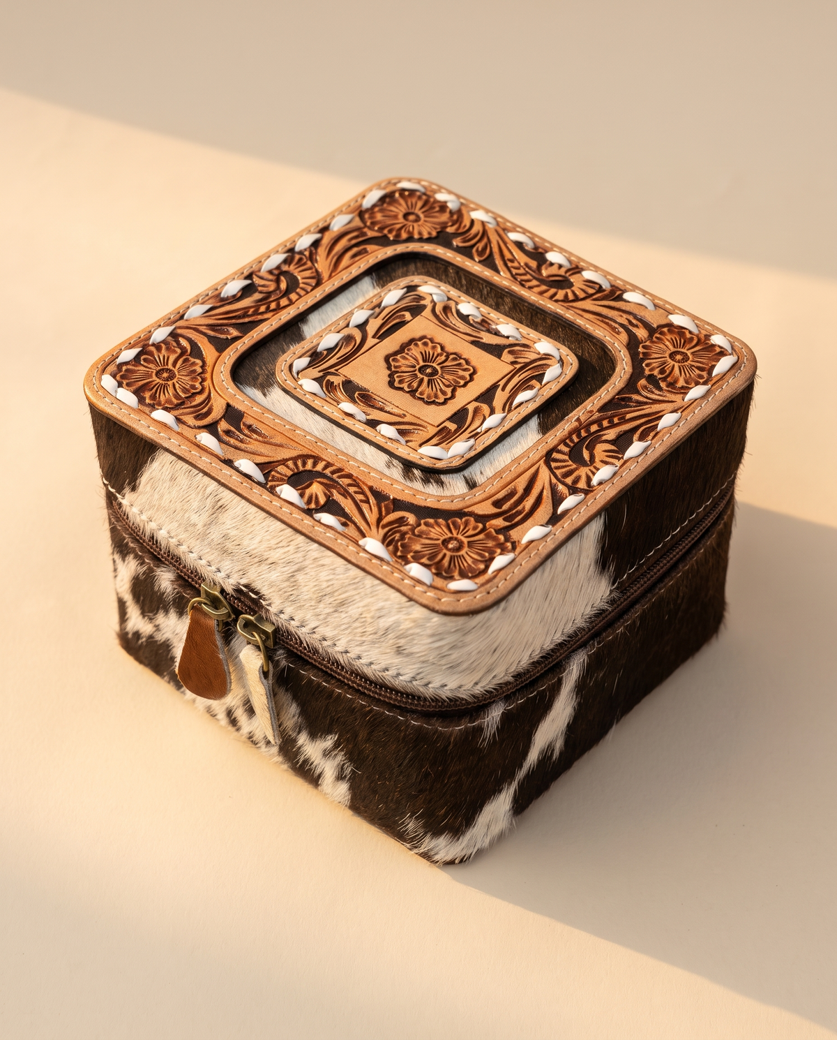 Square Frame cowhide square jewellery box with hand-tooled lid, angled view, by Ya Qalbi