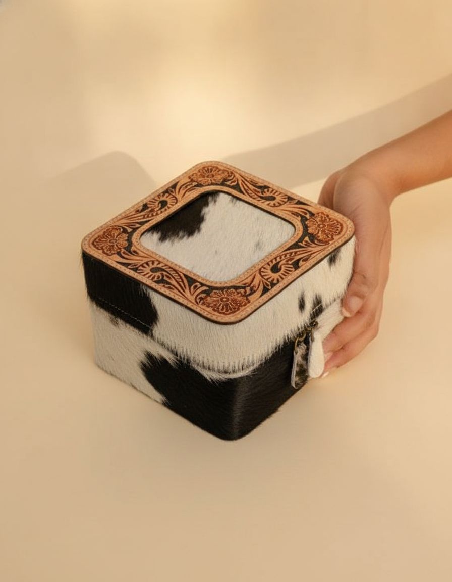 Cowhide jewellery case with tooled frame lid, angled view, by Ya Qalbi