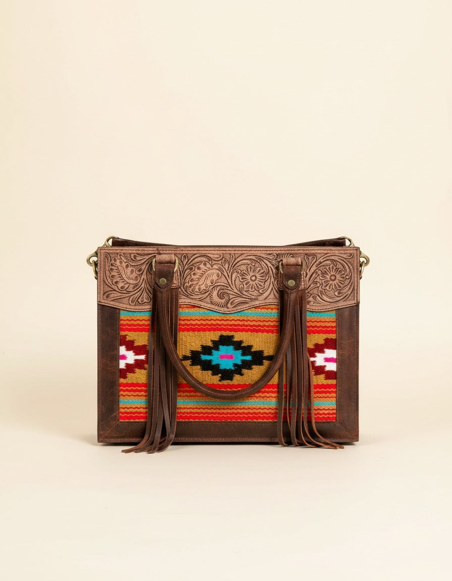 Orange serape fringe tote with tooled leather top, front view, by Ya Qalbi