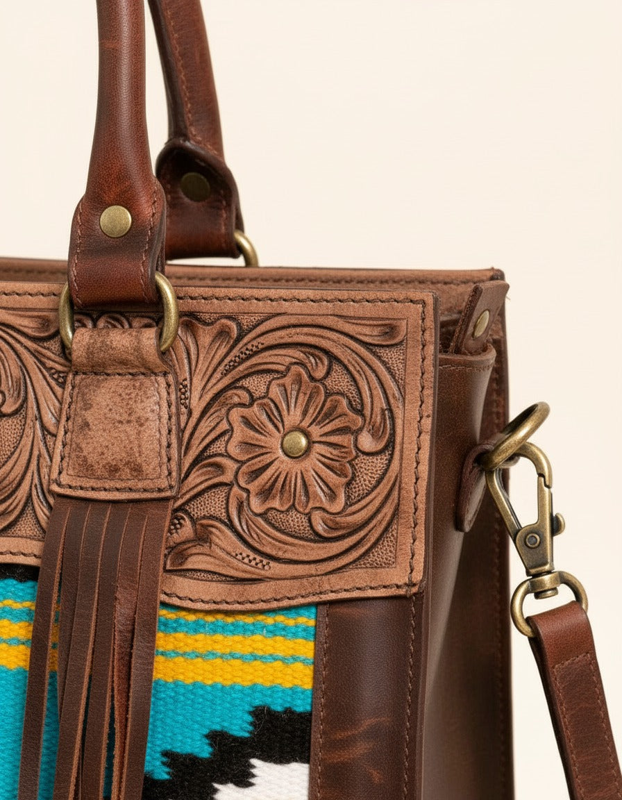 Turquoise and yellow serape fringe tote with tooled leather top, handle and strap close-up, by Ya Qalbi