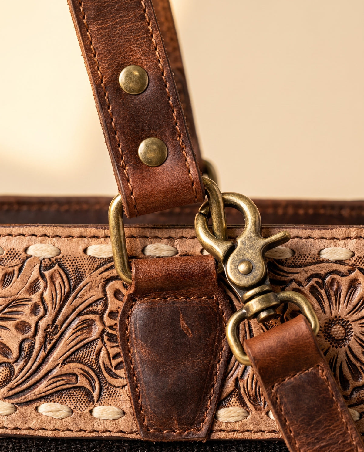 Blue serape woven zip tote with tooled leather band, strap clip close-up, by Ya Qalbi