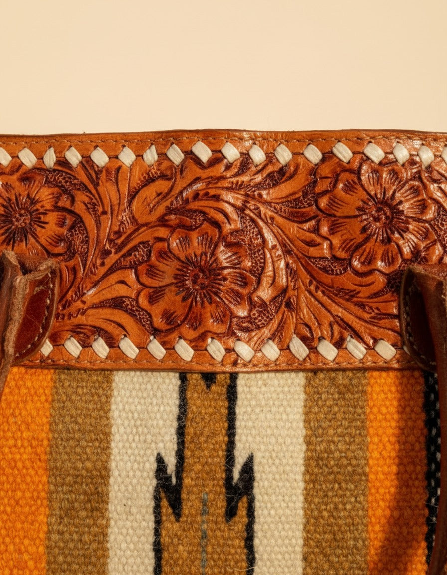 Mustard serape woven zip tote with tooled leather band, tooled band and woven panel close-up, by Ya Qalbi