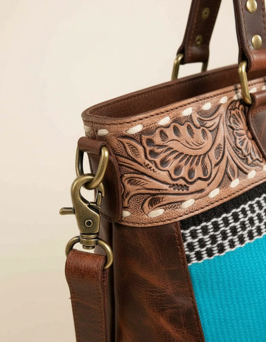 Turquoise serape woven zip tote with tooled leather band, strap clip close-up, by Ya Qalbi