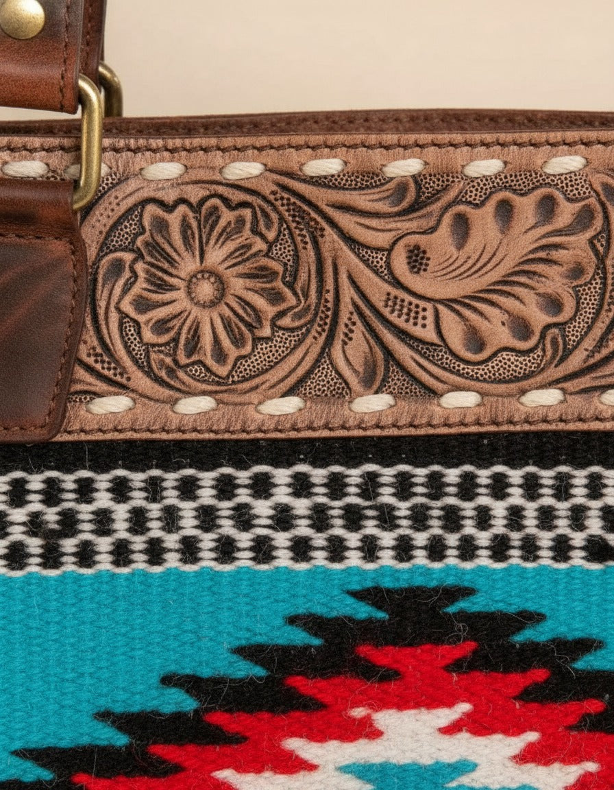 Turquoise serape woven zip tote with tooled leather band, tooled band and woven panel close-up, by Ya Qalbi