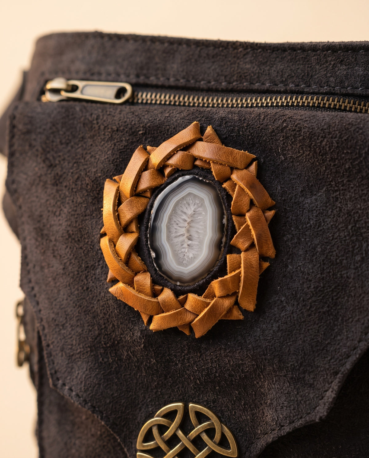 Black suede hip bag with stone and clasp, detail close-up, by Ya Qalbi
