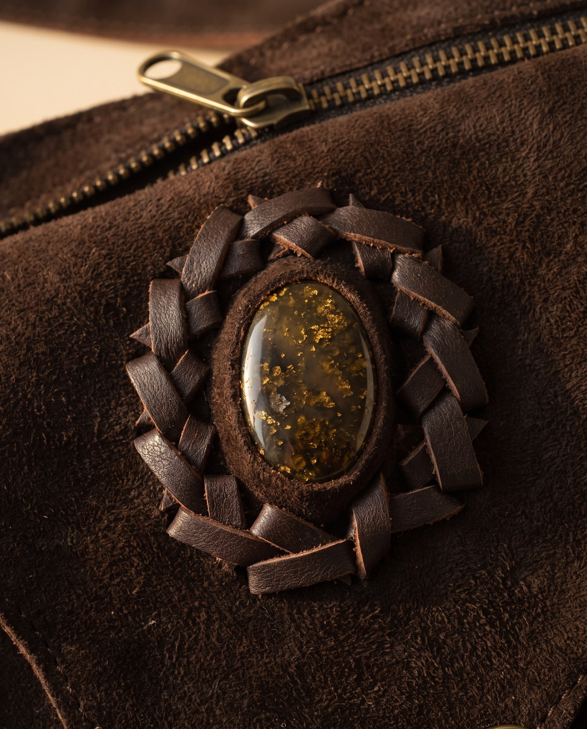Dark brown suede hip bag with stone and clasp, detail close-up, by Ya Qalbi