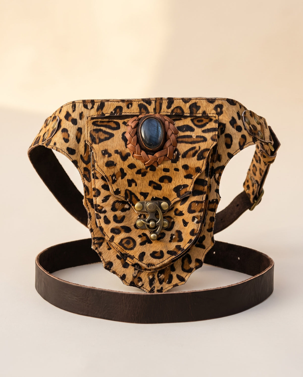 Leopard suede hip bag with stone and clasp, front view, by Ya Qalbi