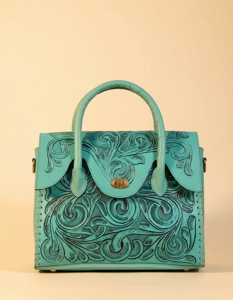 Turquoise hand-tooled leather top-handle handbag, front view, by Ya Qalbi