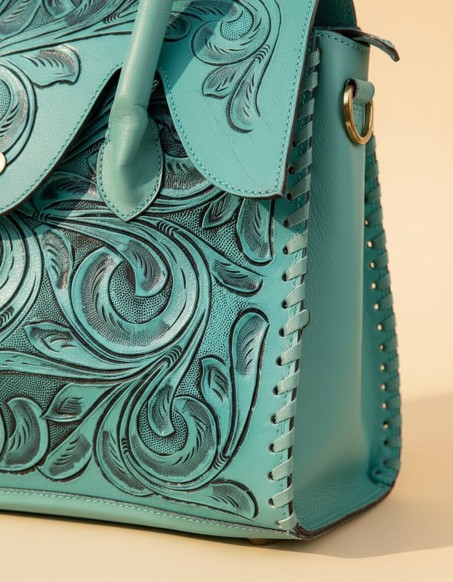 Turquoise hand-tooled leather top-handle handbag, detail close-up, by Ya Qalbi