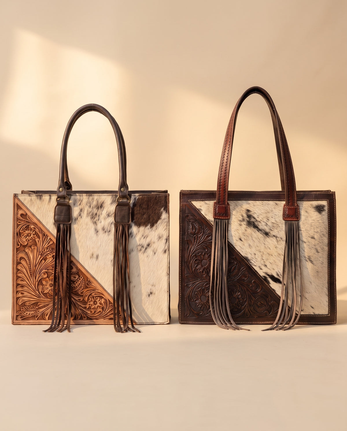 Tan and dark brown tooled triangle hair-on cowhide leather totes side by side by Ya Qalbi