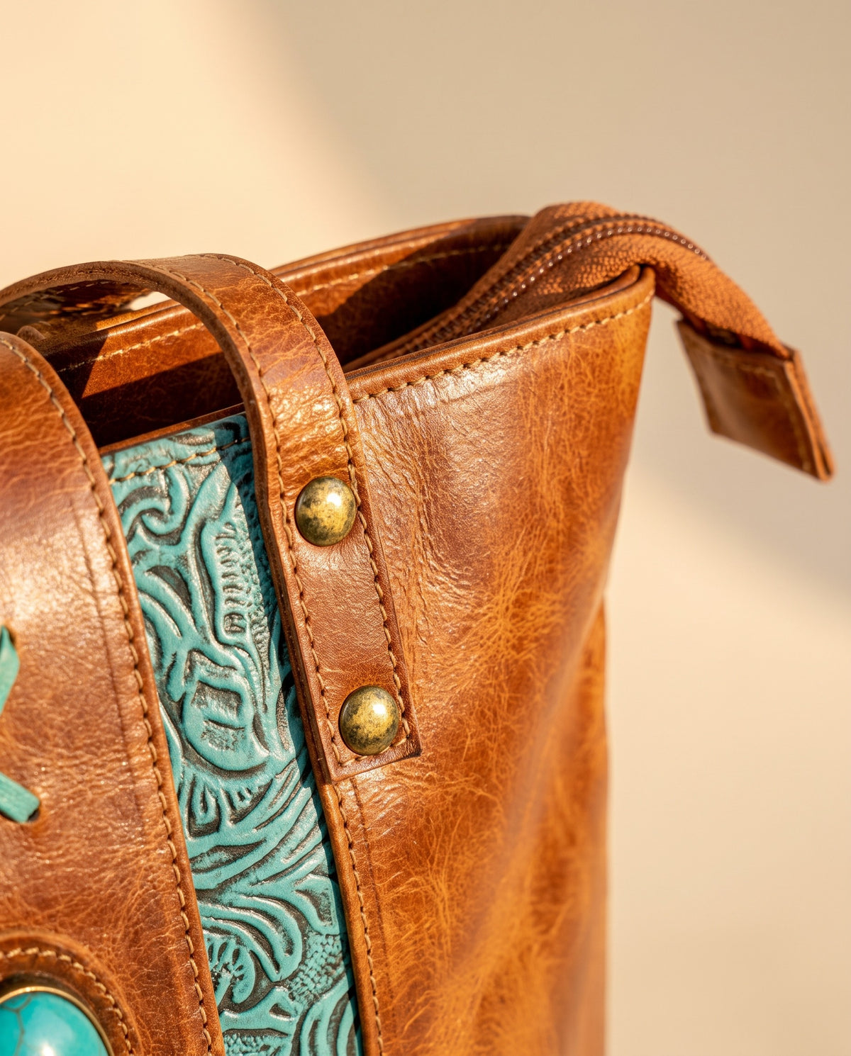Turquoise embossed crunch leather tote with turquoise stone, zip and rivets close-up, by Ya Qalbi