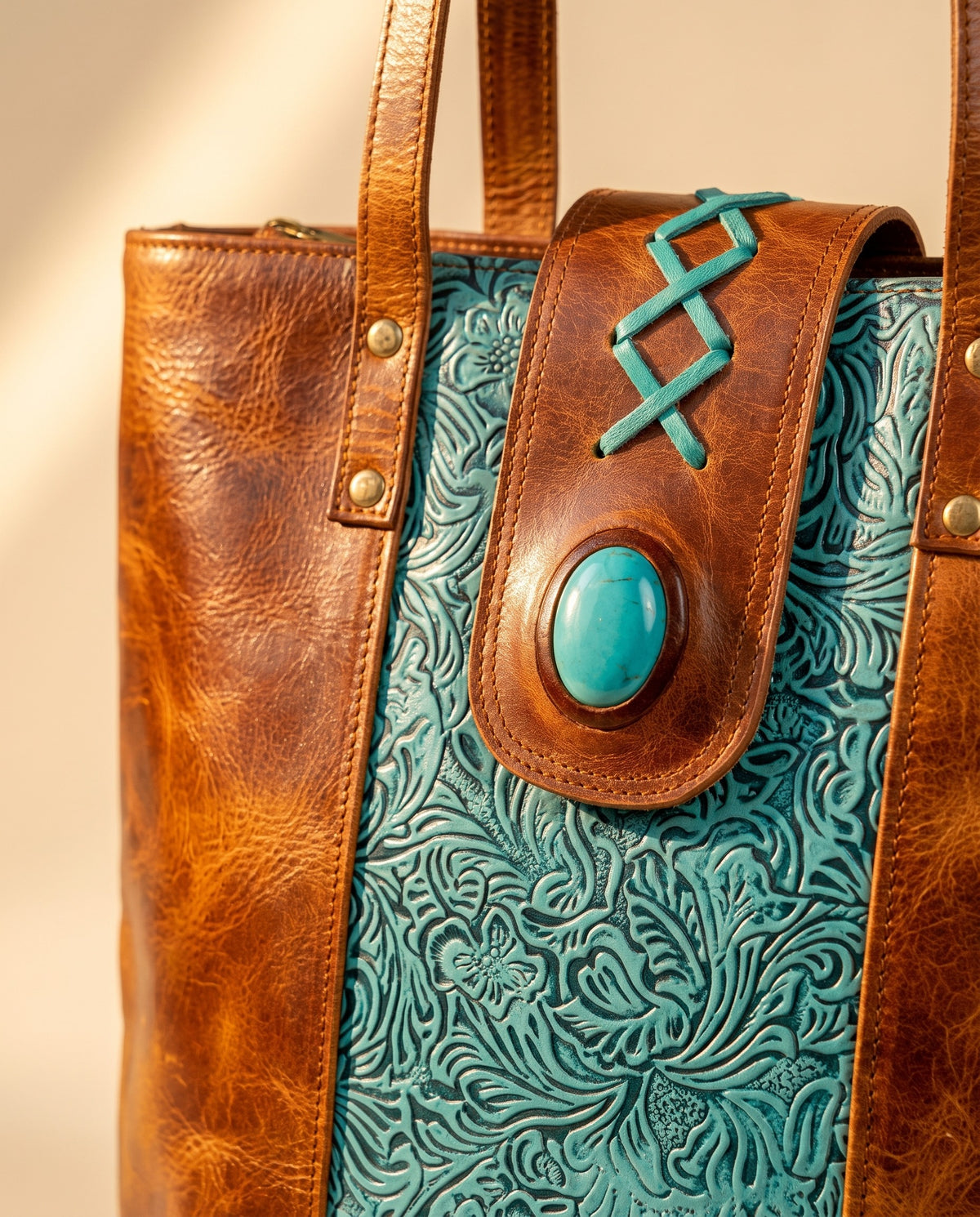 Turquoise embossed crunch leather tote with turquoise stone, turquoise stone tab and lacing close-up, by Ya Qalbi