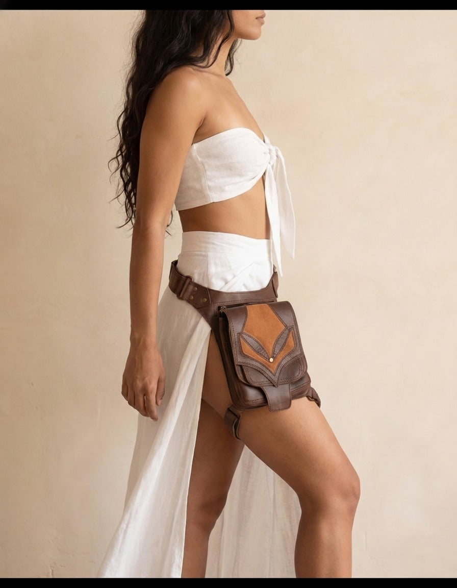 Brown two-tone leather leg bag, worn by a model, by Ya Qalbi