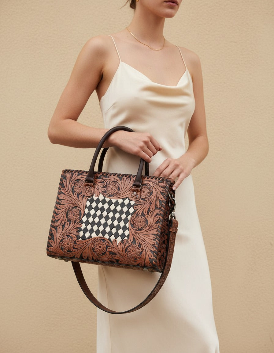 Black and white woven checker hand-tooled leather tote, worn by a model, by Ya Qalbi